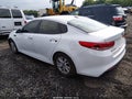 2016 Kia Optima — photo 3 of 11 | VIN 5XXGT4L30GG085952