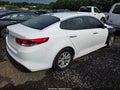 2016 Kia Optima — photo 4 of 11 | VIN 5XXGT4L30GG085952