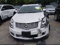2014 Cadillac SRX — photo 12 of 17 | VIN 3GYFNBE39ES582765