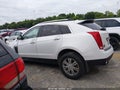 2014 Cadillac SRX — photo 14 of 17 | VIN 3GYFNBE39ES582765