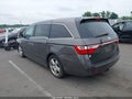 2012 Honda Odyssey — photo 3 of 17 | VIN 5FNRL5H94CB147068