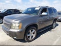 2011 Chevrolet Tahoe — photo 2 of 16 | VIN 1GNSCBE02BR172203