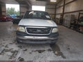 2002 Ford F-150 — photo 11 of 18 | VIN 1FTRX17272NB30203