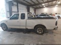 2002 Ford F-150 — photo 13 of 18 | VIN 1FTRX17272NB30203