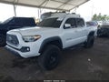 2019 Toyota Tacoma — photo 2 of 16 | VIN 3TMCZ5AN3KM259642