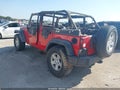 2015 Jeep Wrangler Unlimited — photo 3 of 11 | VIN 1C4BJWDG0FL565890