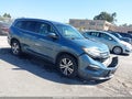 2018 Honda Pilot — photo 1 of 16 | VIN 5FNYF5H3XJB013984