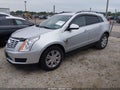 2013 Cadillac SRX — photo 2 of 14 | VIN 3GYFNAE33DS650082
