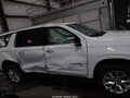 2021 Chevrolet Suburban — photo 13 of 16 | VIN 1GNSKFKD9MR211891