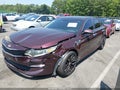 2018 Kia Optima — photo 2 of 16 | VIN 5XXGT4L31JG220198