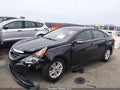 2014 Hyundai Sonata — photo 2 of 17 | VIN 5NPEB4AC9EH877774
