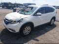 2015 Honda CR-V — photo 2 of 16 | VIN 5J6RM3H78FL004782