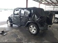 2009 Jeep Wrangler Unlimited — photo 3 of 11 | VIN 1J4GA59179L777818