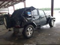 2009 Jeep Wrangler Unlimited — photo 4 of 11 | VIN 1J4GA59179L777818