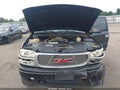 2004 GMC Yukon — photo 10 of 14 | VIN 1GKEK63U44J285405