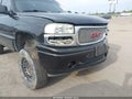 2004 GMC Yukon — photo 13 of 14 | VIN 1GKEK63U44J285405