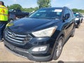 2013 Hyundai Santa Fe — photo 2 of 16 | VIN 5XYZU3LA4DG013786
