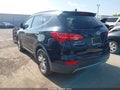 2013 Hyundai Santa Fe — photo 3 of 16 | VIN 5XYZU3LA4DG013786