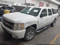 2009 Chevrolet Silverado 1500 — photo 2 of 16 | VIN 3GCEK33M39G102448
