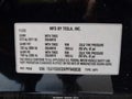 2023 Tesla Model Y — photo 9 of 22 | VIN 7SAYGDEDXPF940838