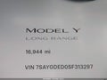 2025 Tesla Model Y — photo 16 of 21 | VIN 7SAYGDED0SF313297