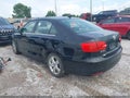 2014 Volkswagen Jetta — photo 3 of 11 | VIN 3VWLL7AJ0EM274059