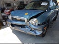 2002 Hyundai Santa Fe — photo 6 of 16 | VIN KM8SC73D02U164587