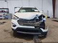 2015 Hyundai Santa Fe — photo 13 of 17 | VIN KM8SMDHF0FU094245