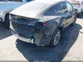 2024 Tesla Model Y — photo 4 of 24 | VIN 7SAYGAEE6RF033272