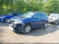 2019 Nissan Rogue — photo 2 of 15 | VIN 5N1AT2MV9KC737305