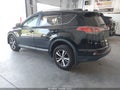 2018 Toyota RAV4 — photo 3 of 16 | VIN 2T3RFREV6JW780078