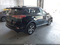 2018 Toyota RAV4 — photo 4 of 16 | VIN 2T3RFREV6JW780078