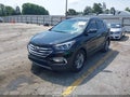 2018 Hyundai Santa Fe — photo 2 of 16 | VIN 5NMZU3LB8JH104103