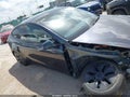 2025 Tesla Model Y — photo 12 of 15 | VIN 7SAYGDED2SA354866