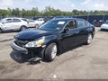 2015 Nissan Altima — photo 2 of 11 | VIN 1N4AL3AP9FN348714