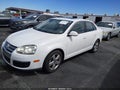 2009 Volkswagen Jetta — photo 2 of 16 | VIN 3VWRZ71K99M089631