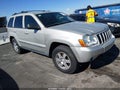 2009 Jeep Grand Cherokee — photo 1 of 13 | VIN 1J8GR48K29C548488