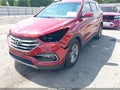 2018 Hyundai Santa Fe — photo 6 of 16 | VIN 5XYZU3LBXJG505999