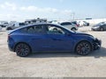 2023 Tesla Model Y — photo 12 of 17 | VIN 7SAYGDEF3PF774969