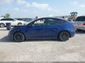 2023 Tesla Model Y — photo 13 of 17 | VIN 7SAYGDEF3PF774969