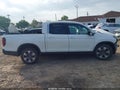 2019 Honda Ridgeline — photo 14 of 17 | VIN 5FPYK2F68KB001784