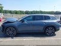 2023 Mazda CX-50 — photo 14 of 16 | VIN 7MMVABEYXPN112704