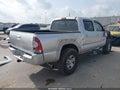 2010 Toyota Tacoma — photo 4 of 17 | VIN 3TMJU4GN6AM103956