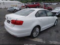 2014 Volkswagen Jetta — photo 4 of 11 | VIN 3VWLL7AJ2EM445877