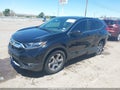 2017 Honda CR-V — photo 2 of 17 | VIN 7FARW1H80HE012897