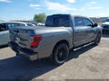 2019 Nissan Titan — photo 4 of 16 | VIN 1N6AA1E63KN512035