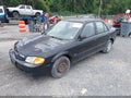 1999 Mazda Protege — photo 2 of 16 | VIN JM1BJ2228X0182427