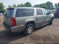 2012 Chevrolet Suburban — photo 4 of 16 | VIN 1GNSKHE77CR255498
