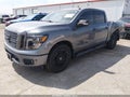 2019 Nissan Titan — photo 2 of 16 | VIN 1N6AA1E68KN500673