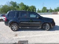 2010 Honda Pilot — photo 12 of 15 | VIN 5FNYF4H90AB030579